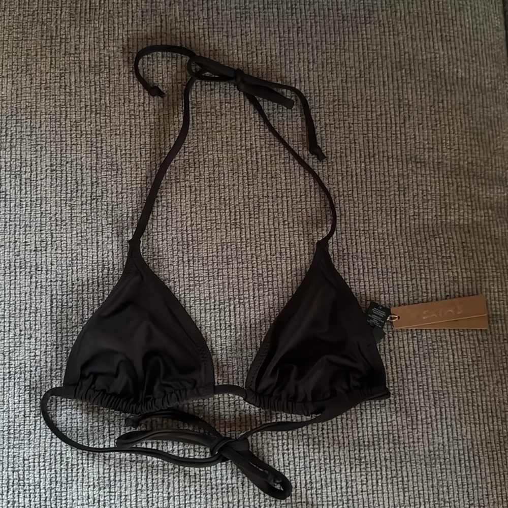 Skims swim top